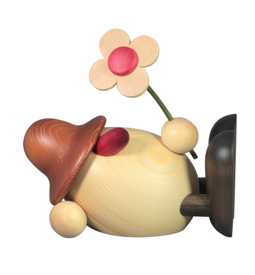 Eierkopf Vater Oskar mit Blume liegend braun