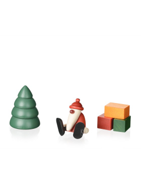 Weihnachtsmann auf Kante sitzend, Baum und Geschenke, mini