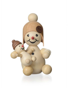 Schneemädchen mit Puppe