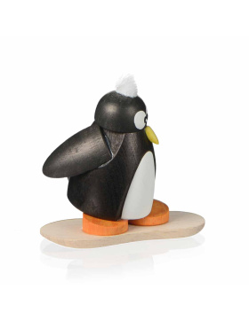 Pinguin auf Snowboard